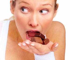 Temptation - Gluttony Woman eating chocolate
